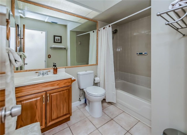 full bathroom with toilet, tile patterned flooring, vanity, and shower / tub combo with curtain