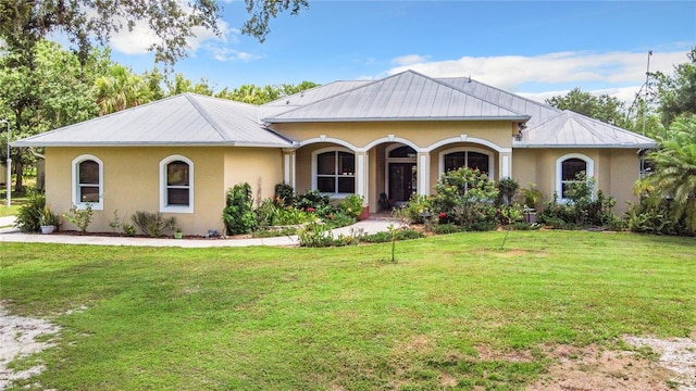 ranch-style home featuring a porch and a front lawn