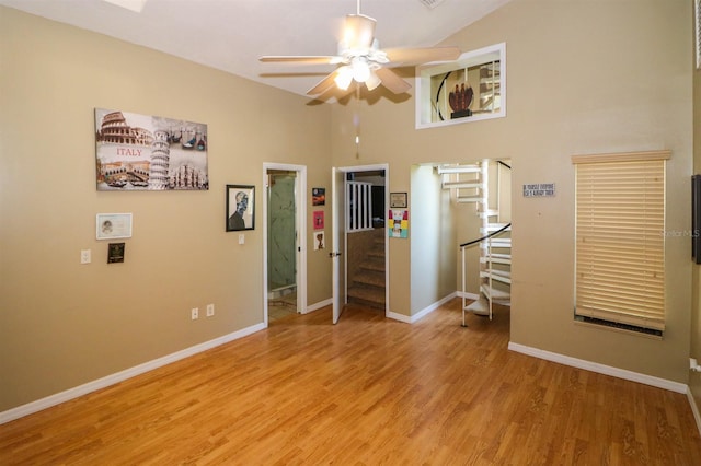 unfurnished bedroom with hardwood / wood-style floors and ceiling fan