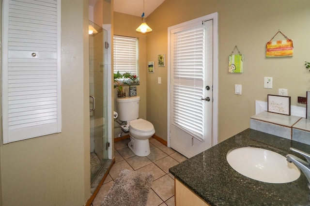 bathroom featuring tile patterned floors, a shower with shower door, vanity, toilet, and lofted ceiling