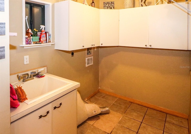 bathroom featuring vanity and tile patterned floors