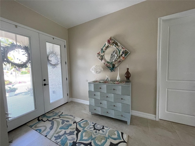 tiled entrance foyer with french doors