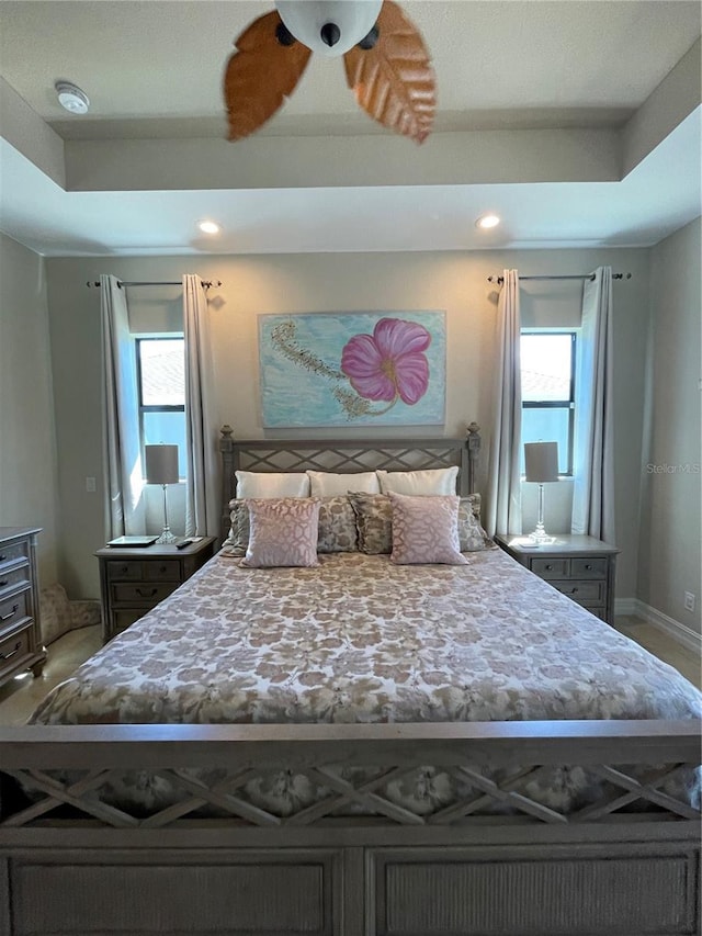 bedroom featuring a tray ceiling