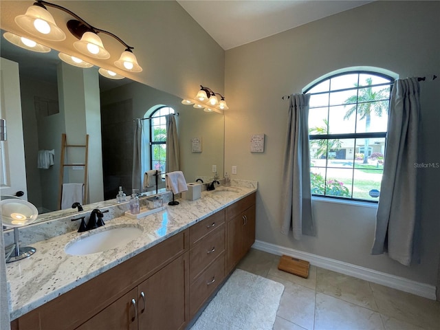 bathroom with vanity and tile patterned flooring