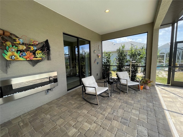 sunroom with a mountain view