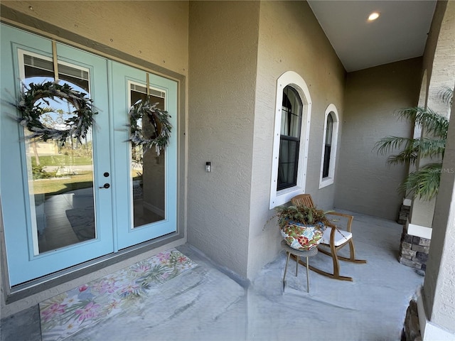 doorway to property with french doors