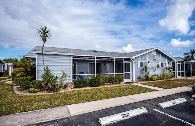 view of front of home with a front yard