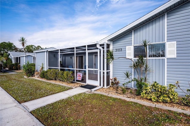 exterior space featuring a front lawn