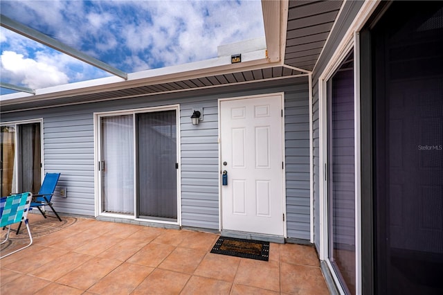 entrance to property with a patio