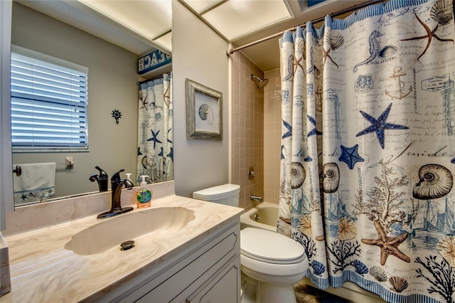 full bathroom with vanity, shower / bath combination with curtain, and toilet