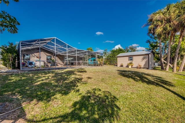 view of yard featuring glass enclosure