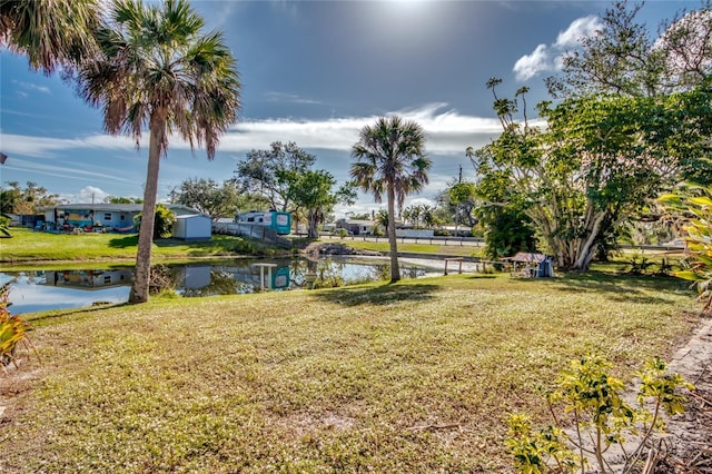 view of yard with a water view