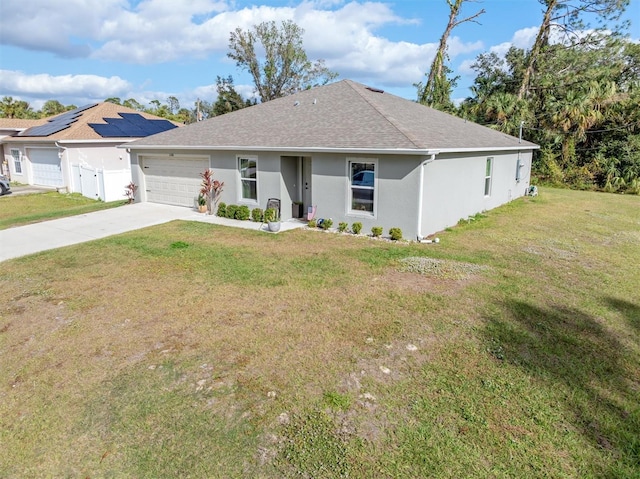 ranch-style home with a front lawn and a garage