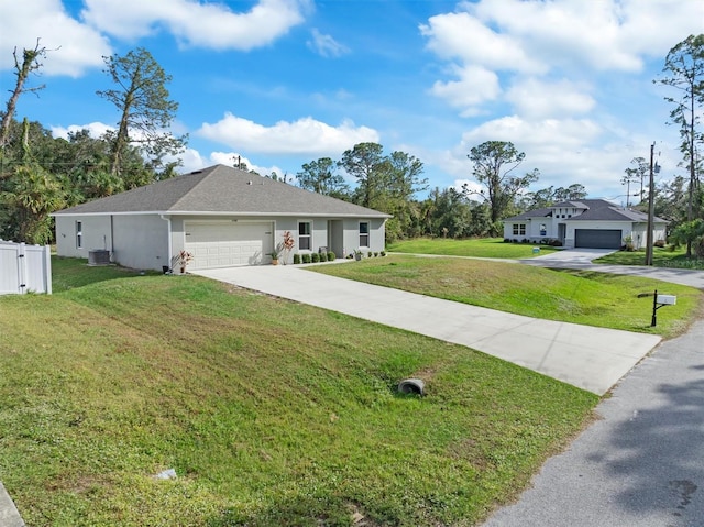 ranch-style home with cooling unit, a front yard, and a garage