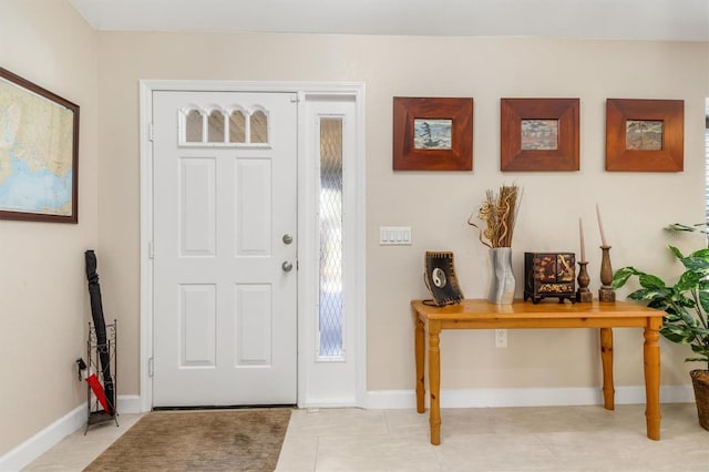 foyer entrance featuring light tile patterned floors