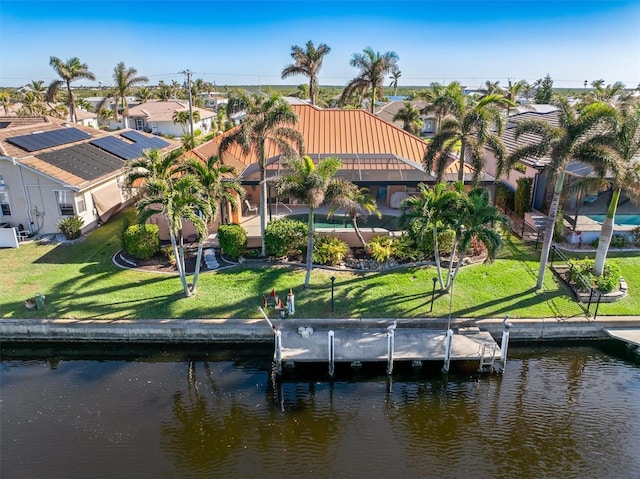 drone / aerial view featuring a water view