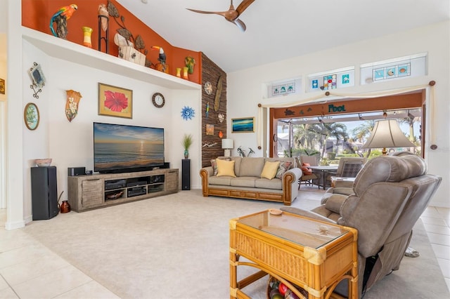 living room featuring tile patterned floors, ceiling fan, and lofted ceiling