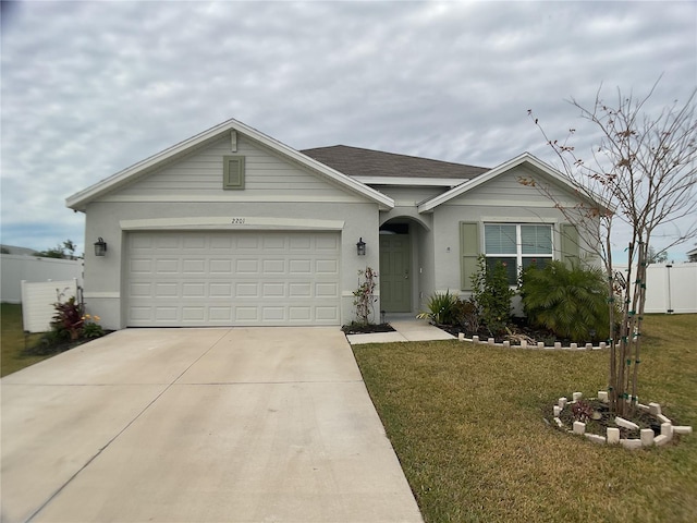 single story home with a front lawn and a garage