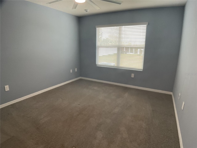 carpeted empty room with ceiling fan