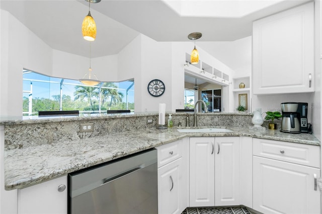 kitchen featuring dishwasher, plenty of natural light, white cabinetry, and sink