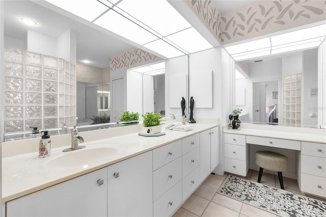 bathroom with vanity and tile patterned floors