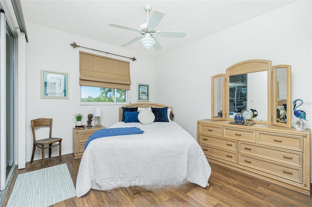 bedroom featuring a closet, ceiling fan, and dark wood-type flooring