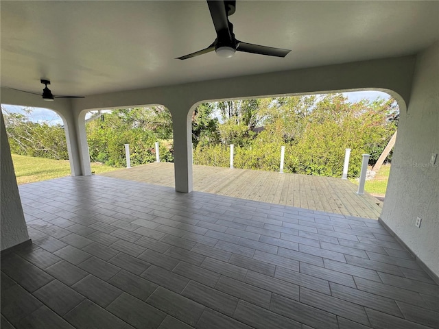 view of patio featuring ceiling fan