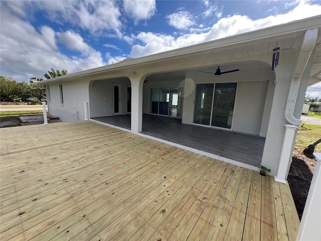 wooden terrace with ceiling fan