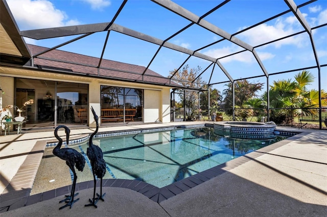 view of swimming pool featuring glass enclosure, an in ground hot tub, and a patio