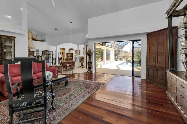 living room with dark hardwood / wood-style flooring