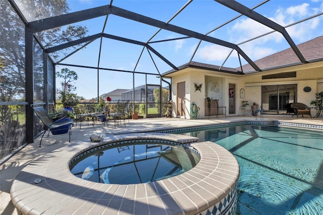 view of swimming pool featuring a patio area, glass enclosure, and an in ground hot tub