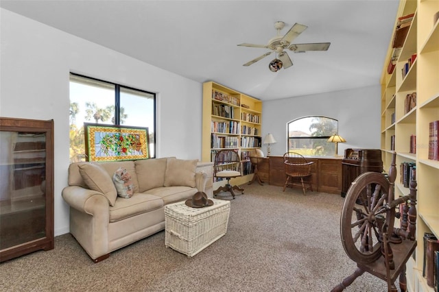 living room featuring ceiling fan, carpet, and plenty of natural light