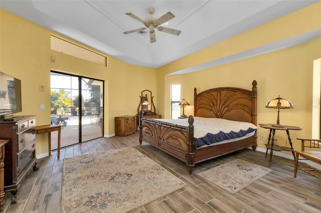 bedroom featuring ceiling fan and access to outside