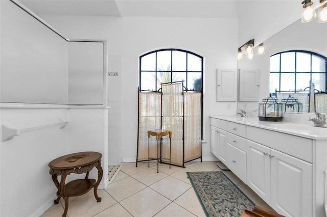 bathroom with tile patterned floors and vanity