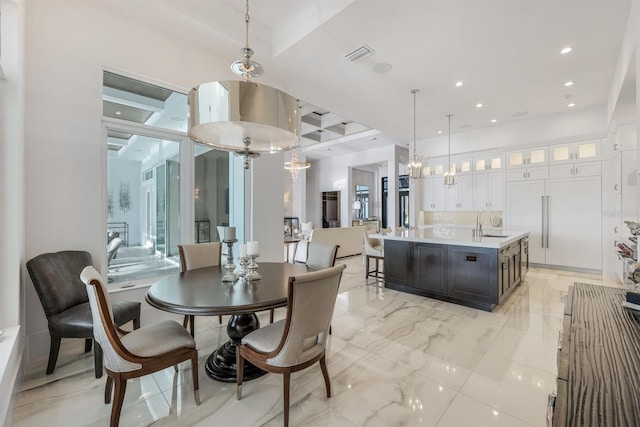 dining area featuring sink