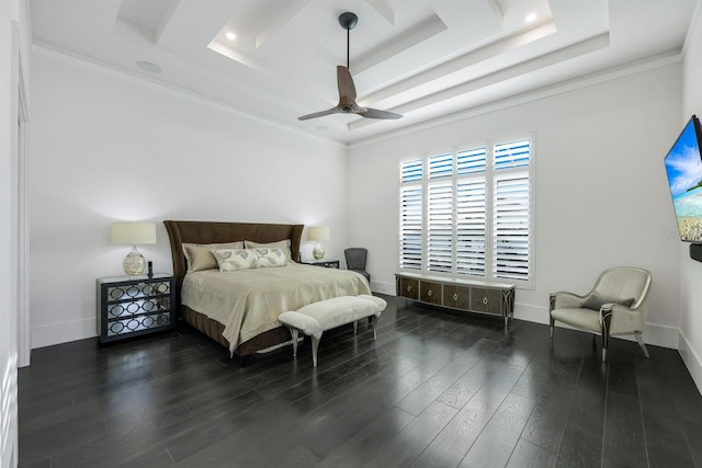 bedroom with a raised ceiling, ceiling fan, crown molding, and dark wood-type flooring