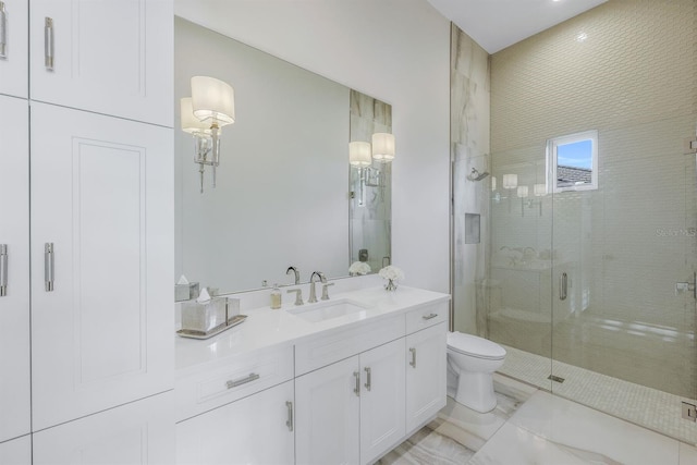 bathroom with vanity, toilet, and walk in shower