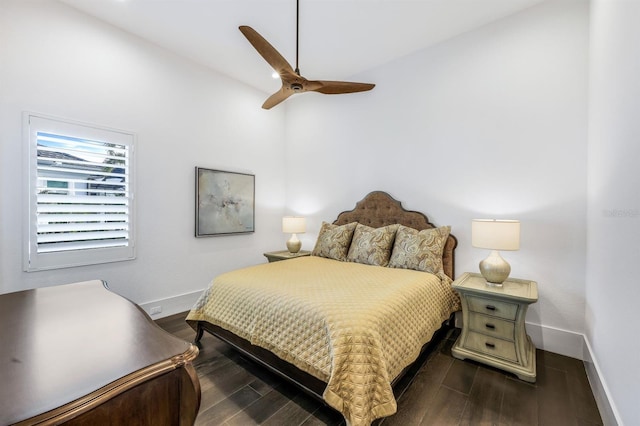 bedroom featuring ceiling fan, lofted ceiling, and dark wood-type flooring