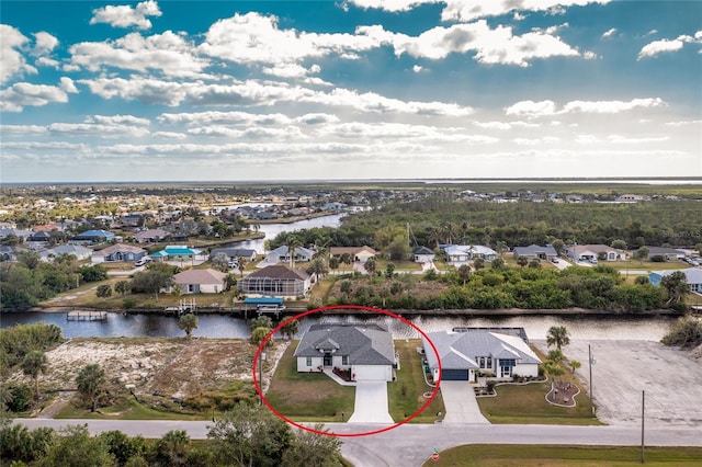 birds eye view of property featuring a water view