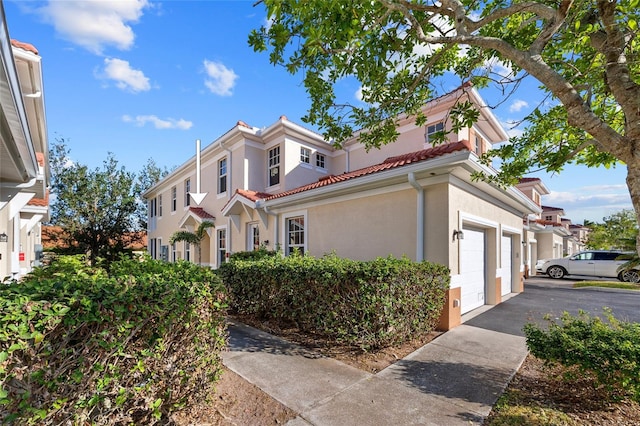 view of front of property with a garage