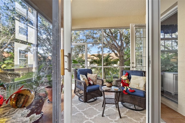 sunroom / solarium featuring a wealth of natural light