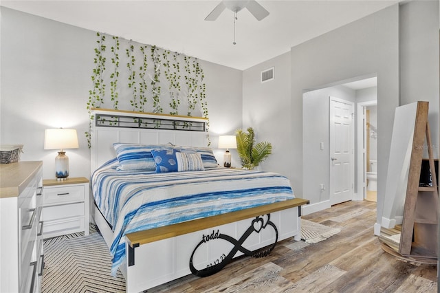 bedroom featuring hardwood / wood-style flooring and ceiling fan