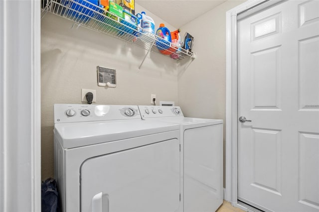 laundry area featuring washing machine and dryer