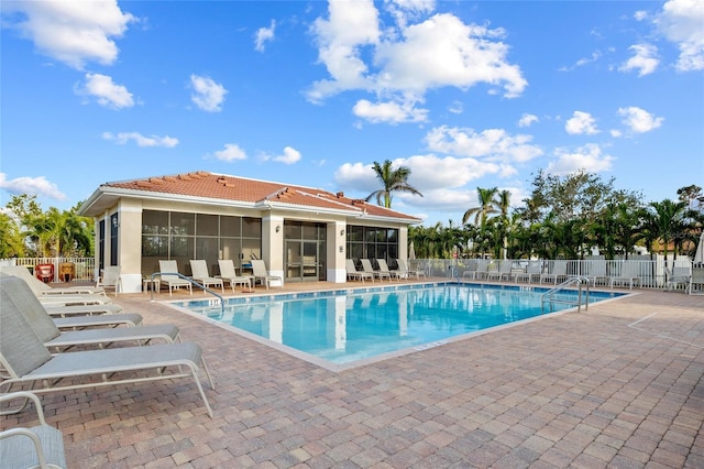 view of swimming pool featuring a patio