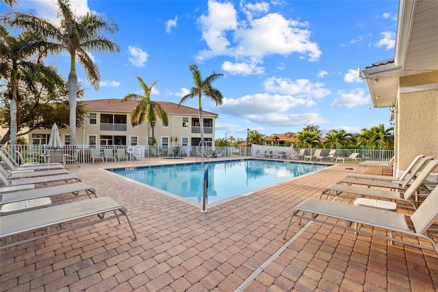 view of pool featuring a patio