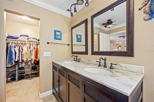 bathroom with ceiling fan, tile patterned flooring, vanity, and ornamental molding