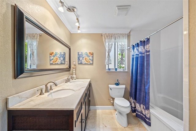 full bathroom featuring shower / tub combo, rail lighting, vanity, crown molding, and toilet