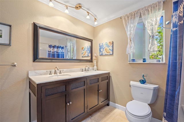 bathroom featuring ornamental molding, tile patterned floors, toilet, vanity, and a shower with shower curtain