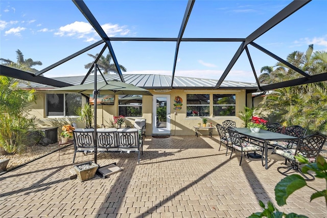 view of patio / terrace with an outdoor living space and glass enclosure