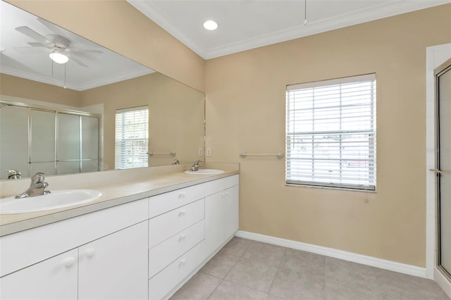 bathroom featuring vanity, ceiling fan, crown molding, tile patterned flooring, and a shower with shower door